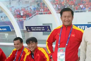 HLV Đinh Hồng Vinh (bìa phải)