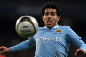 Two-goal Tevez back to haunt United