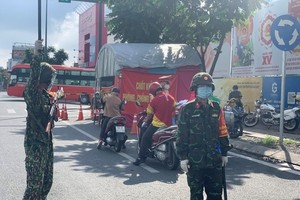 HCMC sees successful first day of military-manned travel restrictions