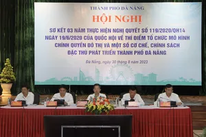 Lãnh đạo TP Đà Nẵng và các bộ đồng chủ trì hội nghị. Ảnh: XUÂN QUỲNH