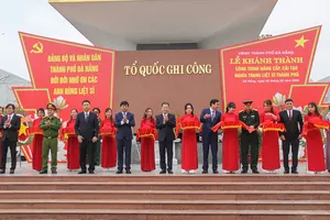 Đại biểu cắt băng khánh thành. Ảnh: XUÂN QUỲNH