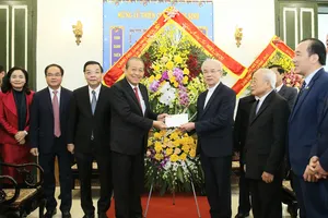 Phó Thủ tướng Thường trực Chính phủ Trương Hòa Bình thăm Ủy ban Đoàn kết công giáo Việt Nam. Ảnh VGP/LÊ SƠN