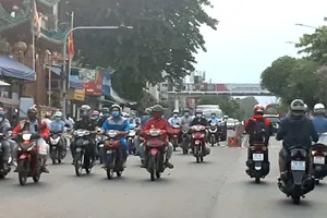 Xe gắn máy lưu thông lâu ngày cần được kiểm định khí thải  (Ảnh chụp tại TPHCM trước đợt giãn cách xã hội lần thứ 4)