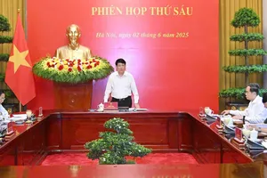 Chủ tịch nước Lương Cường chủ trì phiên họp thứ sáu Hội đồng Quốc phòng và An ninh nhiệm kỳ 2021 - 2026. Ảnh VIẾT CHUNG.