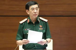 Đại tướng Phan Văn Giang, Phó Thủ tướng, Bộ trưởng Bộ Quốc phòng, phát biểu tại phiên họp. Ảnh: QUANG PHÚC 