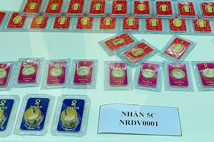 Giá vàng trong nước sáng nay đảo chiều giảm. Ảnh: NHUNG NGUYỄN