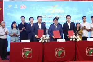 Quang cảnh lễ ký kết hợp tác. Ảnh: THANH TÙNG 