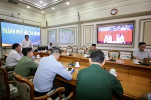 Buổi họp công tác chuẩn bị lễ phát động tại điểm cầu TPHCM. Ảnh: DŨNG PHƯƠNG 