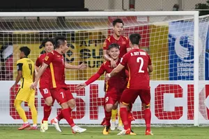 Quang Hải ăn mừng bàn thắng vào lưới Malaysia. Ảnh: NHẬT ĐOÀN