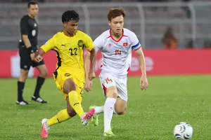 Nguyễn Hoàng Đức cùng các tuyển thủ Việt Nam giành chiến thắng tại Malaysia. ẢNH: ĐỨC CƯỜNG 
