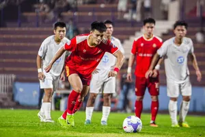 Tuyển thủ U23 Việt Nam Nguyễn Thanh Nhàn ghi bàn trên chấm phạt đền: ẢNH: CAND 