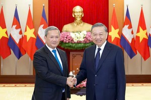 党中央总书记、国家主席苏林会见柬埔寨首相洪玛奈。