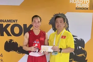 Võ sĩ Hà Thị Linh (trái) xuất sắc giành suất tham dự Olympic Paris 2024