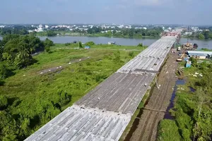 Cầu Bình Gởi nối liền phường Thuận An và xã Bình Mỹ (TPHCM mới). Ảnh: TNO