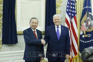 Tổng Bí thư Tô Lâm gặp Tổng thống Hoa Kỳ Donald Trump. Ảnh: TTXVN