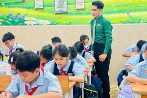 Học sinh Trường Tiểu học Lương Định Của (phường Bàn Cờ, TPHCM) trong một giờ học. Ảnh: THU TÂM 