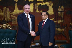 越南政府总理范明政与俄罗斯塔斯社社长安德烈合影。