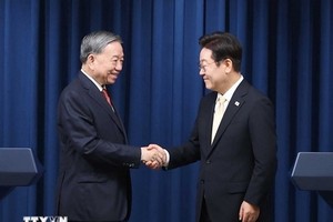 越南党中央总书记、国家主席苏林与韩国总统李在明。