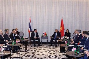 越南党中央总书记、国家主席苏林会见泰国SCG集团董事长兼首席执行官塔玛萨•塞塔乌冬。图自越通社