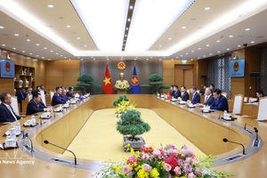 政府总理黎明兴会见出席打击通缉犯罪会议的东盟各国代表团团长。图自越通社