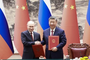 5月20日上午，中国国家主席习近平在北京人民大会堂同来华进行国事访问的俄罗斯总统普京举行会谈。（新华社）