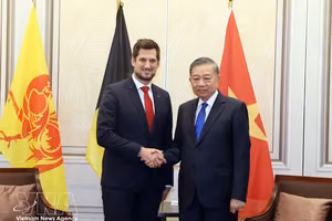 越南党中央总书记、国家主席苏林会见瓦隆大区首席大臣阿德里安·多利蒙。图自越通社