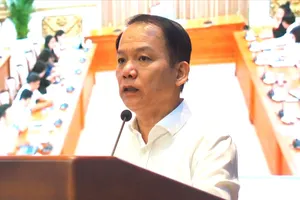 Bộ trưởng Bộ Tư pháp Hoàng Thanh Tùng phát biểu tại hội nghị. Ảnh: CẨM HÀ 