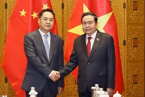 Chủ tịch Quốc hội Trần Thanh Mẫn và Chủ tịch Hội Hữu nghị đối ngoại nhân dân Trung Quốc Dương Vạn Minh. Ảnh: TTXVN