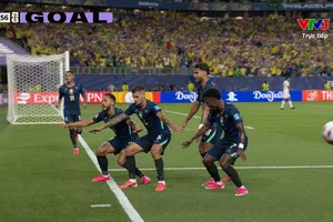Vinicius kiến tạo, thủ môn Placide đấm bóng ra, Cunha đá bồi mở tỷ số cho Brazil