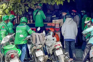 Tài xế xe công nghệ cần “tấm lưới” an sinh