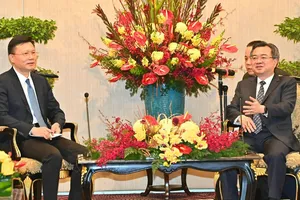 Đồng chí Nguyễn Thanh Nghị, Ủy viên Trung ương Đảng, Phó Bí thư Thường trực Thành ủy TPHCM đã tiếp đồng chí Trần Hướng Tân, Phó Bí thư Thành ủy Quảng Châu, Trung Quốc. Ảnh : VIỆT DŨNG