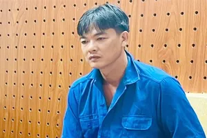 Dũng tại cơ quan công an. Ảnh: CA