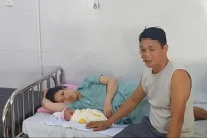 Sức khỏe sản phụ và trẻ sơ sinh đã ổn định. Ảnh: NGUYỄN LONG