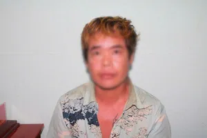 Phan Minh Tuấn tại cơ quan công an. Ảnh: CA