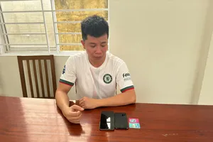 Đối tượng Nguyễn Ngọc Anh tại cơ quan điều tra. Ảnh: CACC