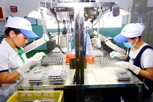 本市新順出口加工區一家企業的生產線。