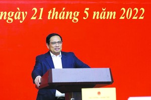 政府總理范明政。