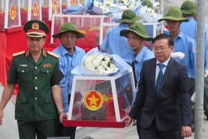 安葬從柬老歸集烈士骸骨