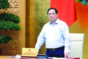 政府總理范明政在會議上發表講話。