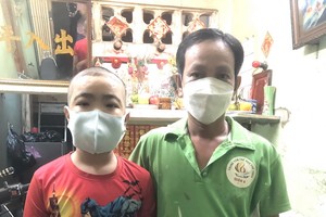 楊錦明和患上腎病的兒子楊偉倫向本報求助。