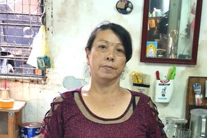 林玉珍正等錢動手術。