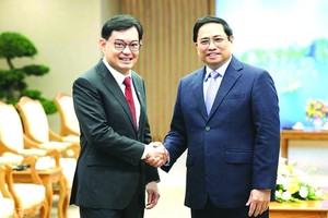 政府總理范明政接見新加坡副總理王瑞傑。