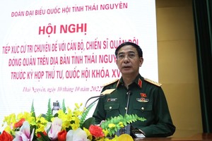 國防部部長潘文江大將在會議上發表講話。（圖：紅玻）