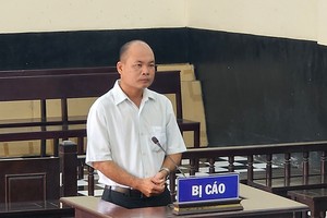 被告人阮玉诊。