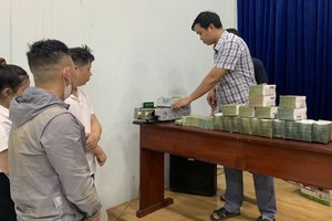 绑架团伙索要的现金数额被警方没收。