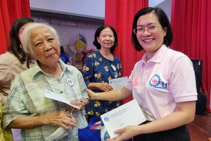 关照越华妇女和少儿