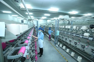 在兴安省全中资的Jasan纺织漂染公司。