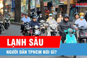 Người dân TPHCM "co ro" trong đợt lạnh hiếm gặp