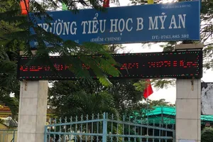 Cảnh cáo một hiệu trưởng dùng ảnh khỏa thân để hăm dọa chia tay với người tình