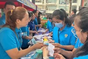 BHXH TPHCM và LĐLĐ TPHCM phối hợp tuyên truyền Luật BHXH mới 